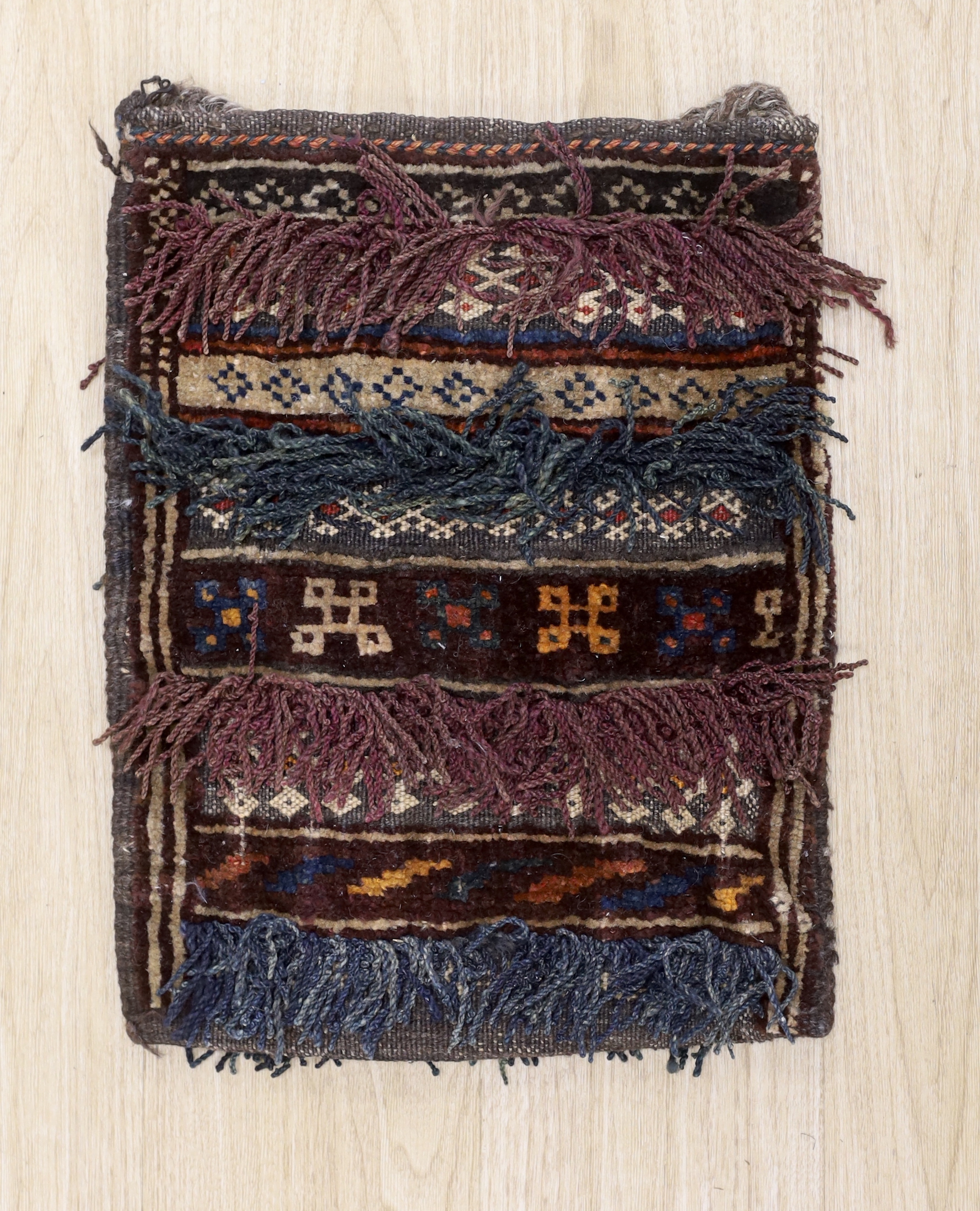 A Caucasian ‘salt’ carpet bag with tasseling, 38cm x 48cm